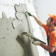 Man plastering a wall
