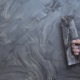 Plasterer renovating indoor walls
