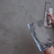 Plaster being applied to a wall