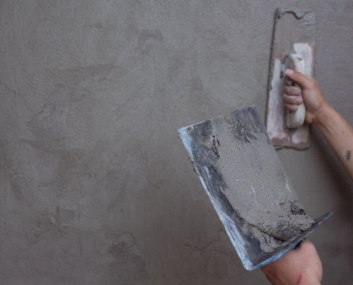 Plaster being applied to a wall
